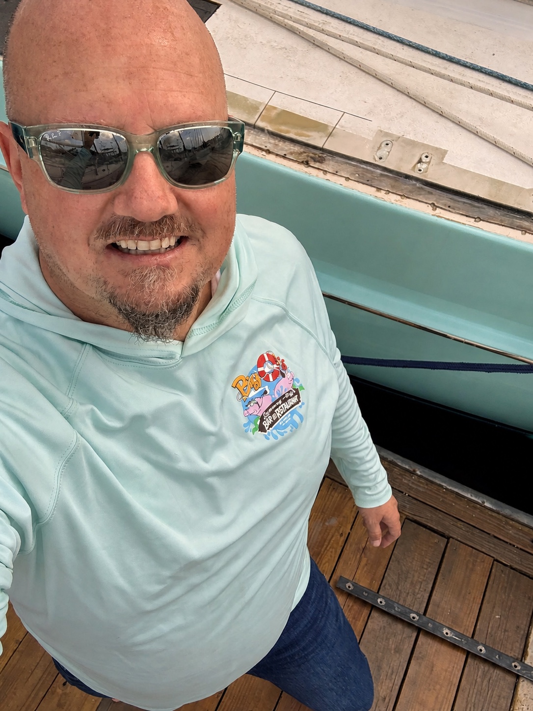 Ewan aboard a sailing yacht